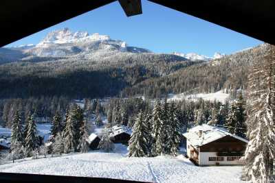 Book now this prestigious mountain villa for an exclusive holiday in the Dolomites in Cortina d'Ampezzo with 6 bedrooms and 6 bathrooms